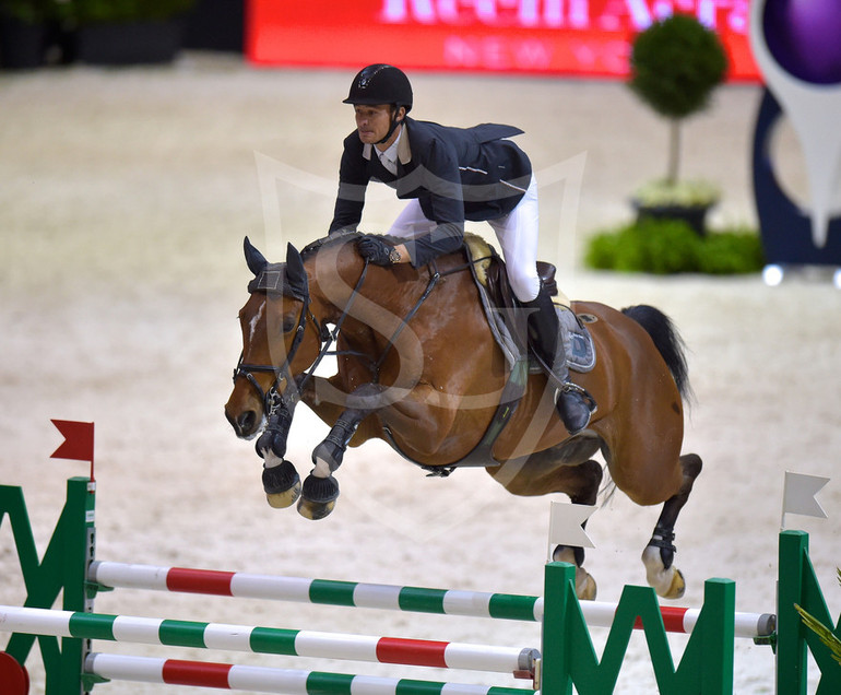 Equestrian - Longines FEI World Cupª Jumping Final in Lyon (FRA) date 17/04/2014 - 21/04/2014 Olympic champions Steve Guerdat (SUI) and Nino des Buissonnets at full stretch on their way to the joint lead going into the final leg of the Longines FEI World Cupª Jumping Final in Lyon (FRA).Credit: FEI/Arnd Bronkhorst/Pool Pic Disclaimer: Free of charge for editorial use. For further information, contact Ruth Grundy +41 78 750 61 45, ruth.grundy@fei.org