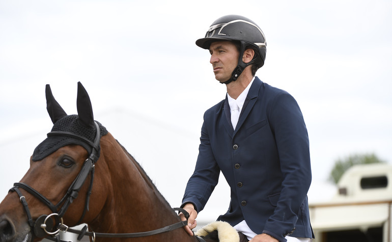 Steve Guerdat riding Corbinian