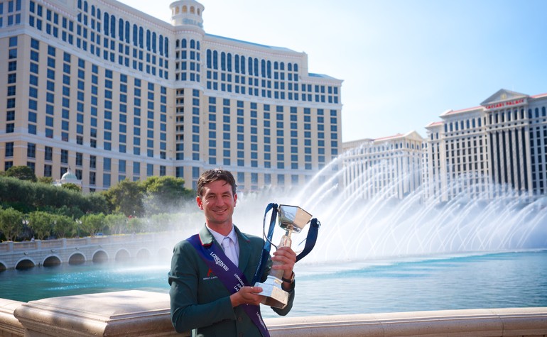 Switzerland's Olymoic champion Steve Guerdat raises the trophy aloft after victory in the Longines FEI World Cup™ Jumping Final in Las Vegas (USA). Equestrian - Longines FEI World Cup™ Jumping Final in Las Vegas (USA) Equestrian - Longines FEI World Cup™ Jumping Final in Las Vegas (USA) date 15/04/2015 - 19/04/2015 Credit: FEI/Arnd Bronkhorst/Pool Pic Disclaimer: Free of charge for editorial use. For further information, contact Ruth Grundy +41 78 750 61 45, ruth.grundy@fei.org